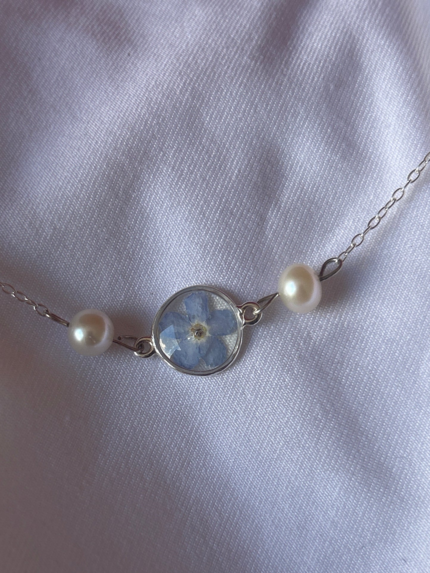Forget me nots and pearl necklace