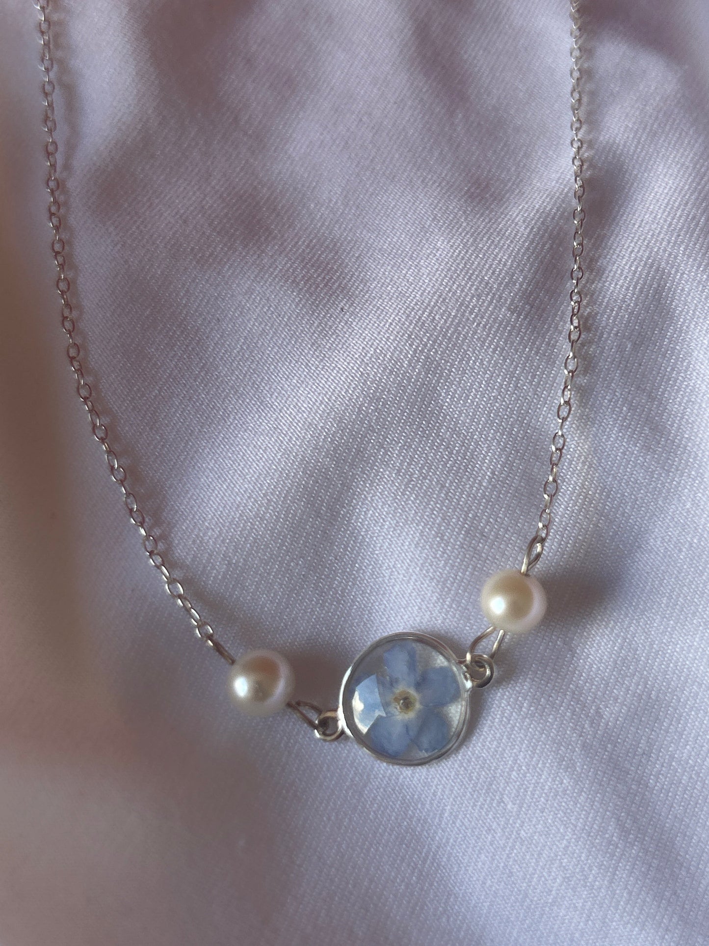Forget me nots and pearl necklace